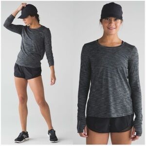 Lululemon Beat the Heat top in heathered black, size 4